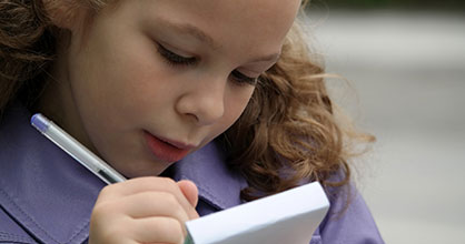 Young writer takes notes